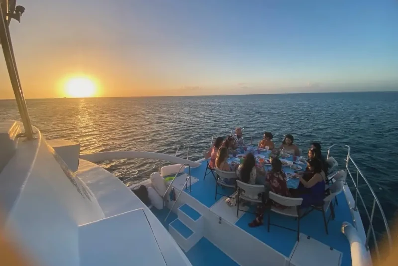 Multi-generational family celebrating together on a private Saona Island charter with El Tour Caribe.